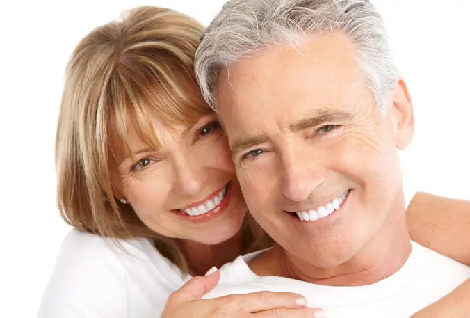 A couple showing white teeth
