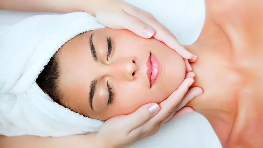 A lady having a facial massage